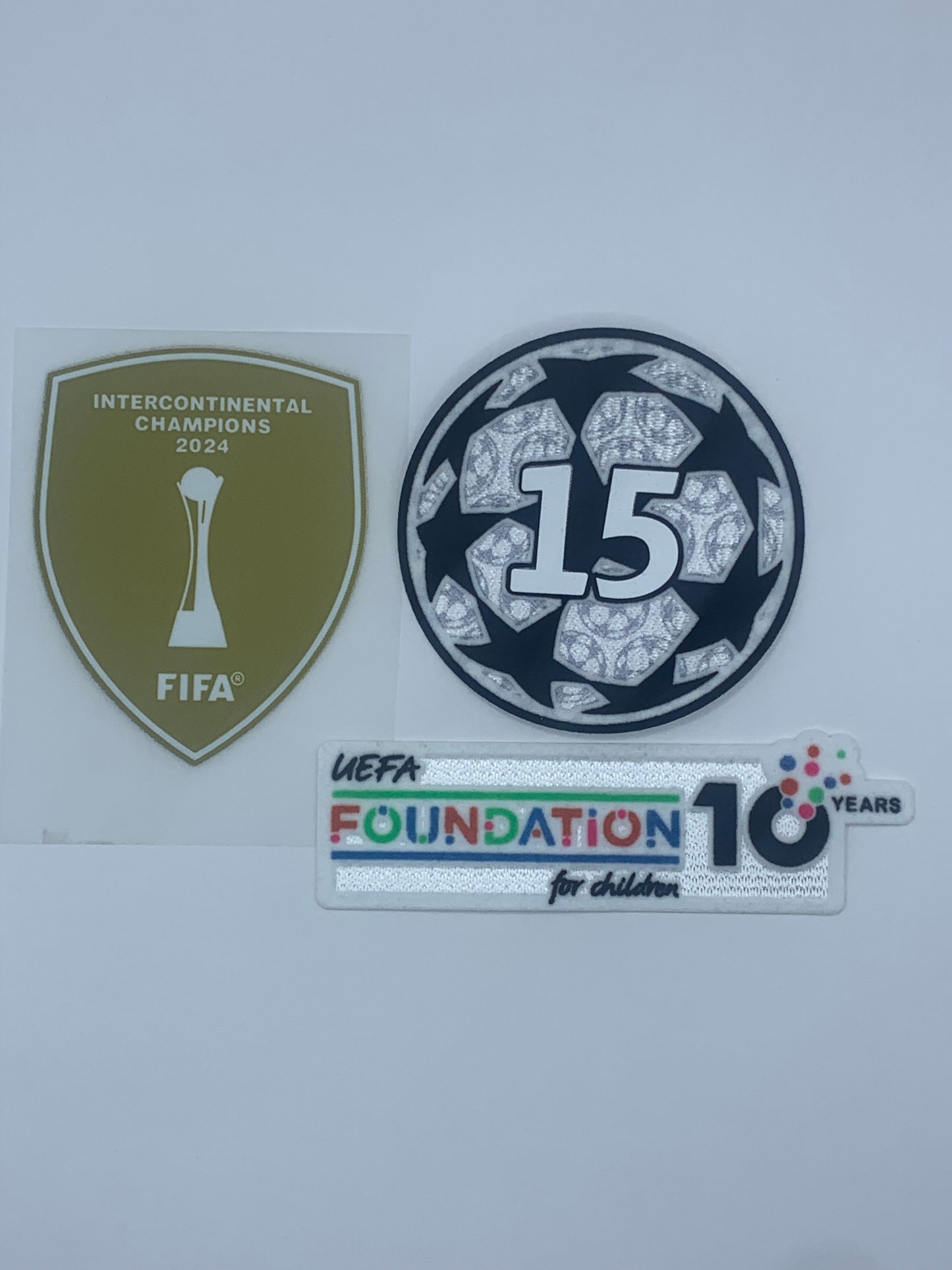 25-26 UCL Starball 15 Times Winner + 10th Anniversary UEFA Foundation + Intercontinental Cup Winners Badge Set