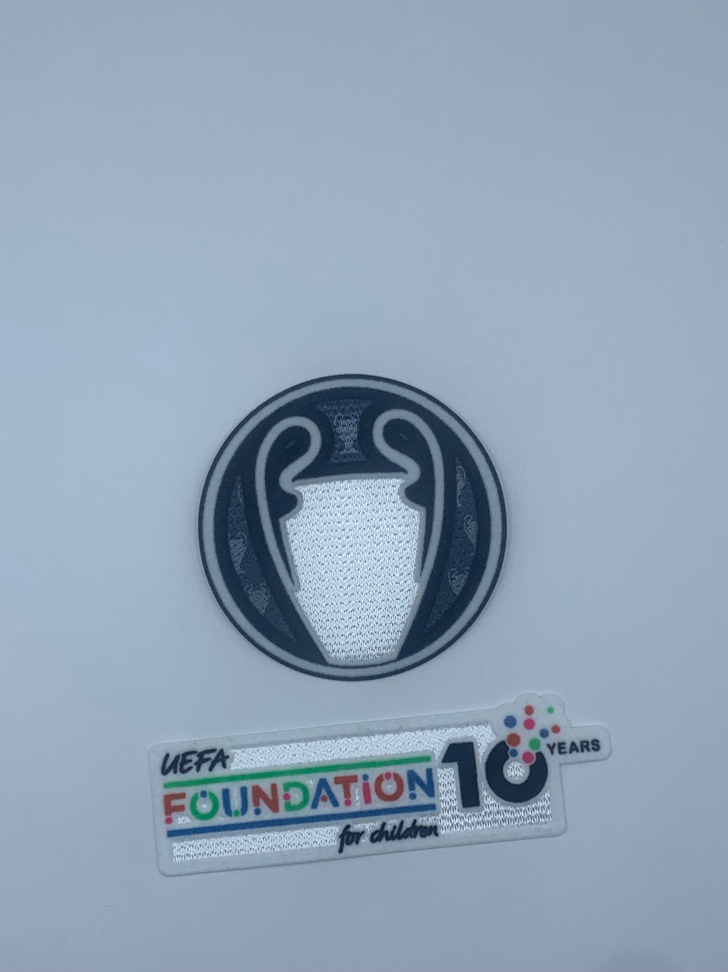 25-26 UCL Titleholder Trophy + 10th Anniversary UEFA Foundation Patch Set (PSG)